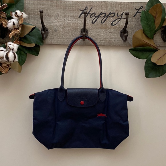 Longchamp Handbags - ALMOST BRAND NEW Navy blue and red Long Champ Le Pliage Club Small Shoulder Tote